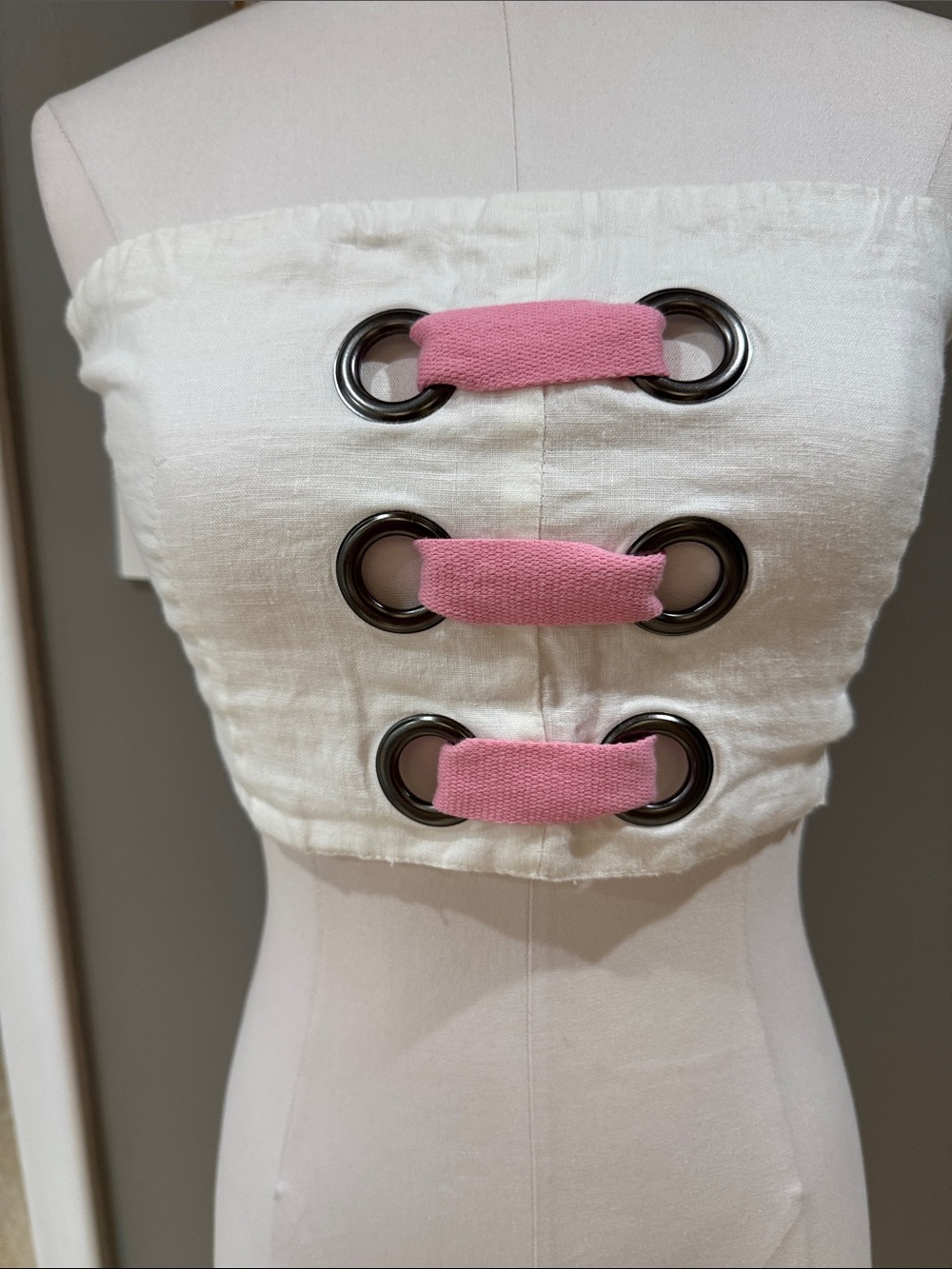 White Strapless Corset/Crop Top with Pink Grommet Accents